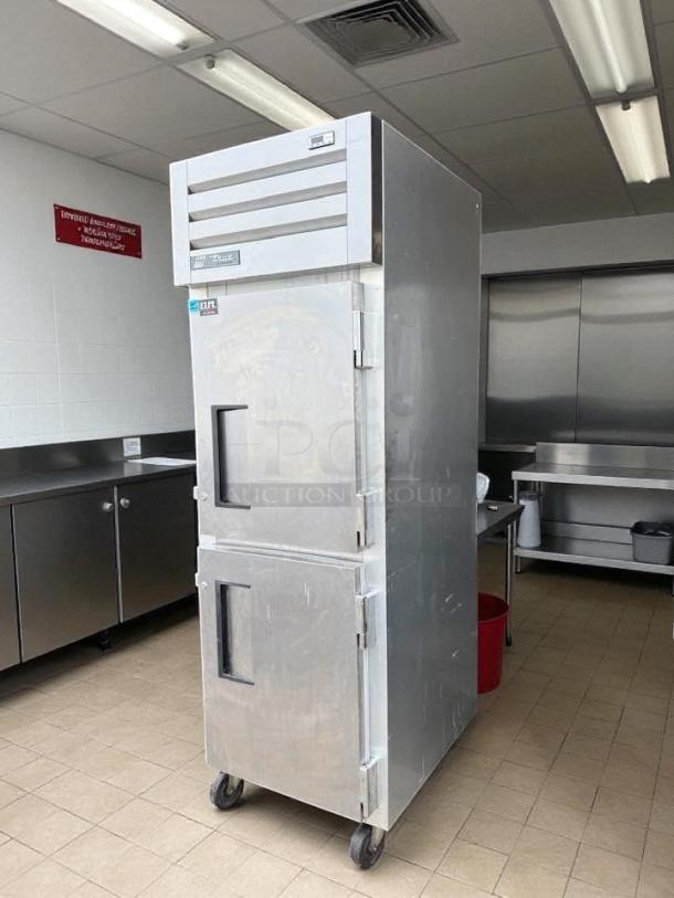 True STG1F-2HS-HC Spec Series 27.5" reach-in freezer, dual-door, tested, excellent condition, stainless steel, on casters.