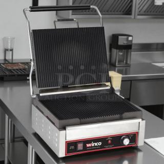 Winco EPG-1C Single Panini Press with cast iron grooved plates, tested and working; 120v, excellent condition.