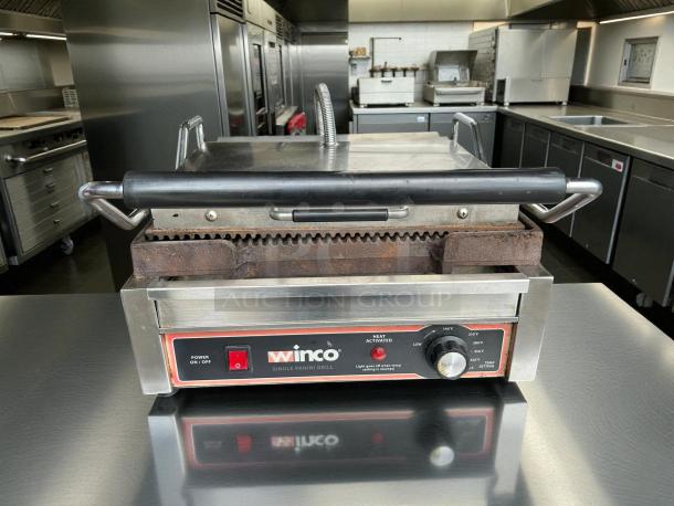 Winco EPG-1C single commercial panini press with cast iron grooved plates, 120v, tested and working.
