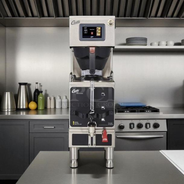 Curtis G4GEMS63A1000 coffee brewer, 1.5 gal capacity, automatic dispenser, silver/black, tested working, great condition.