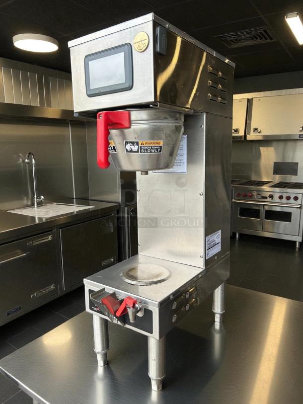 Curtis G4GEMS63A1000 coffee brewer, excellent condition, 1 1/2 gal capacity, tested, 110/220v, warning labels visible.