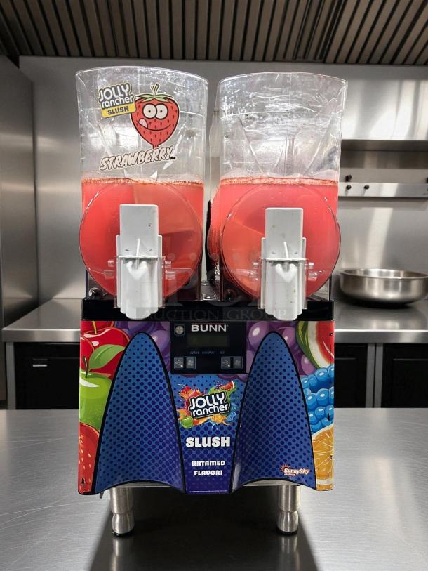 Bunn 58000.0015 ULTRA NX Frozen Drink Machine, black and stainless steel, excellent condition, with Jolly Rancher branding.