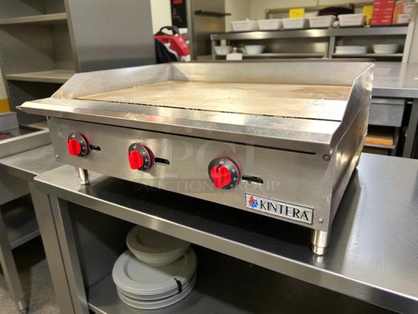 Kintera countertop gas griddle, 36"W, with three burners and thermostatic control. Great condition, tested and working.