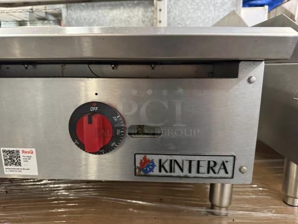 Kintera countertop gas griddle, 36"W, great condition, thermostatic control, 3 burners, metal body, brand label visible.