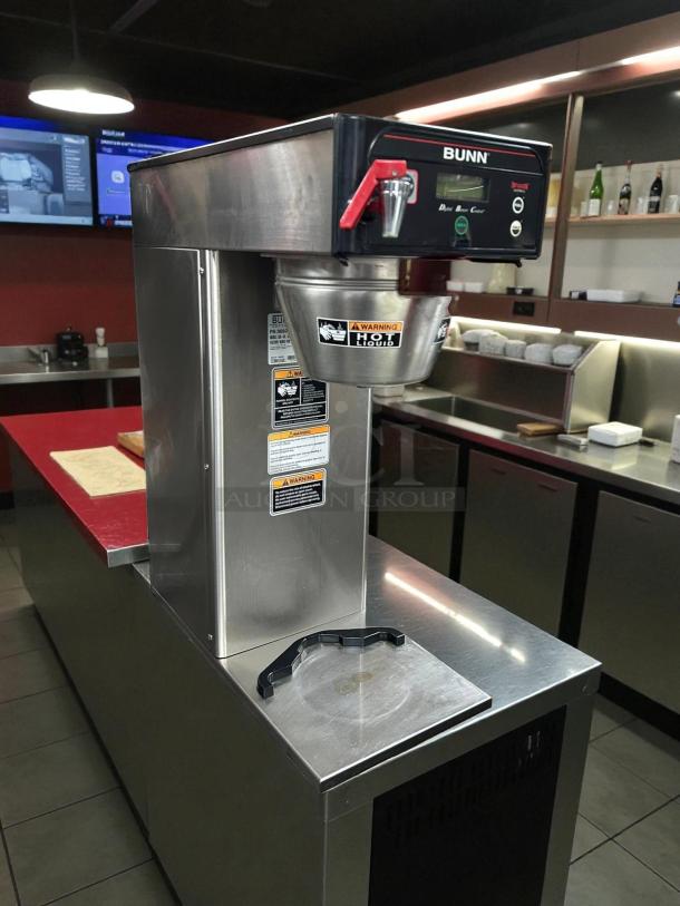 Bunn 53100.0000 ICB-DV Automatic Coffee Brewer, dual voltage, in great condition. Tested and working. Warning labels visible.