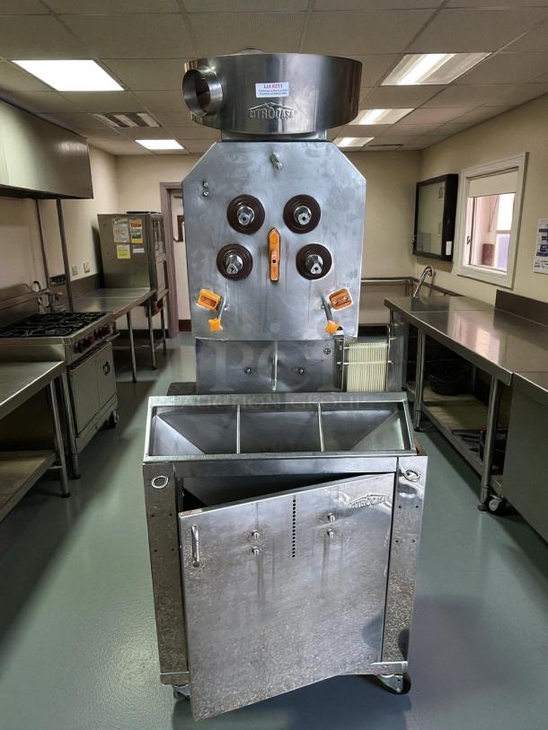 Citrocasa 8000 SB-ATS citrus juicer in stainless steel, as-is. Features dual spouts, three bins, visible wear, and lot label #211.