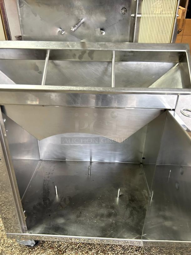 Citrocasa 8000 SB-ATS Advance Citrus Juicer, stainless steel, used condition, visible wear, sold as is, no labels shown.