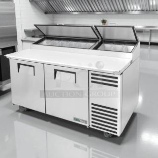 True TPP-AT-67-HC pizza prep table, 67", stainless steel, refrigerated base, great condition, tested and working.