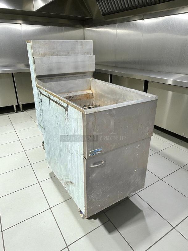 Pitco VF-65S gas fryer, 65 lb vat, floor model, natural gas, excellent condition, tested and working, stainless steel finish.