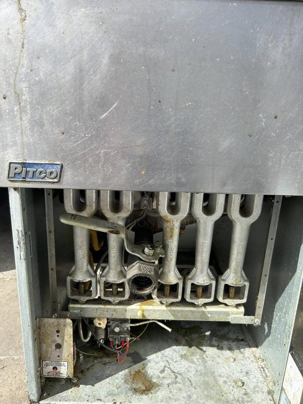 Pitco VF-65S gas fryer in excellent condition, 65 lb capacity, floor model, natural gas, with visible brand logo and components.