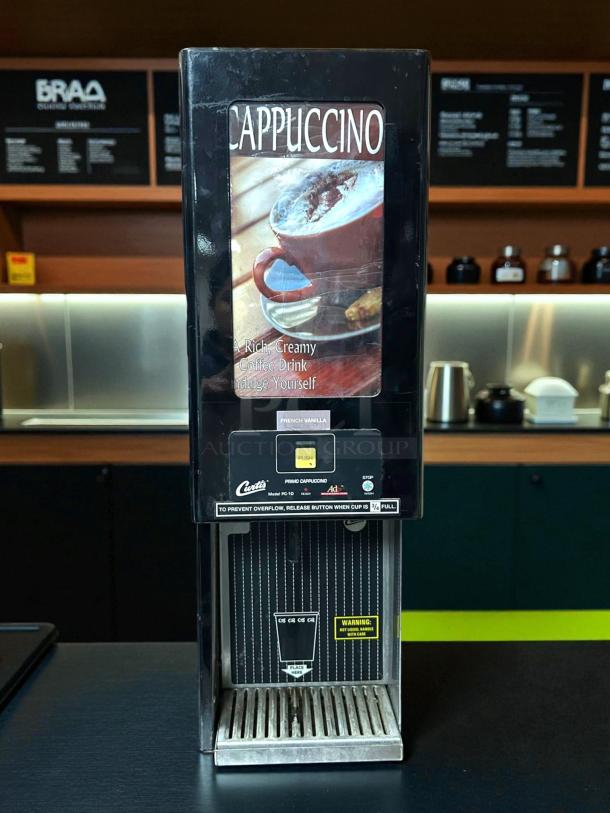 Curtis PC 1D-10 self-serve cappuccino machine in excellent condition, tested and working, with French Vanilla label.