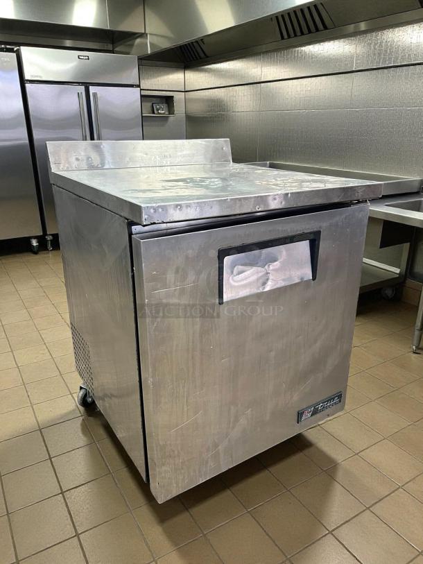 True TWT-27F-HC 27" worktop freezer with 3 9/16" backsplash, excellent condition, tested and working.