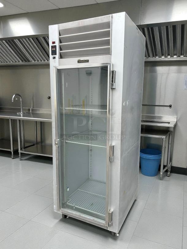 Traulsen G11010 reach-in refrigerator, excellent condition, right-hinged glass door, tested 115v, 29 7/8", stainless steel.