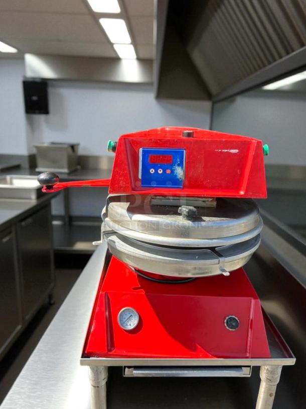 PROLUX DP2300 12" semi-automatic pizza press, tested and working. Features a red casing and digital display. Cart not included.