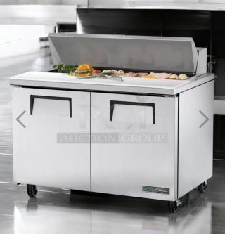 TRUE TSSU-60-12 sandwich prep table in prime condition, featuring 2 doors, stainless steel, fully tested, on casters.