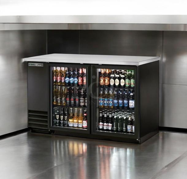 True TBB-24-48G-HC back bar refrigerator with double glass doors, pristine condition, stocked with beverages, fully tested.