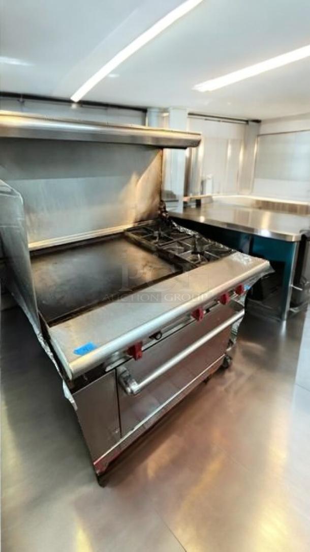 American Range AR-6B/24G 6-burner gas range with 24" griddle and convection oven, pristine condition, fully tested.