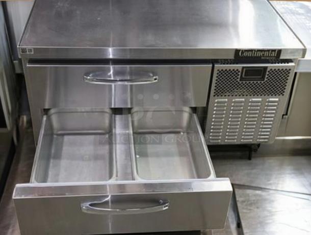 Used Continental Refrigerator Chef Base, commercial series, stainless steel, two-drawer worktop, prime condition.