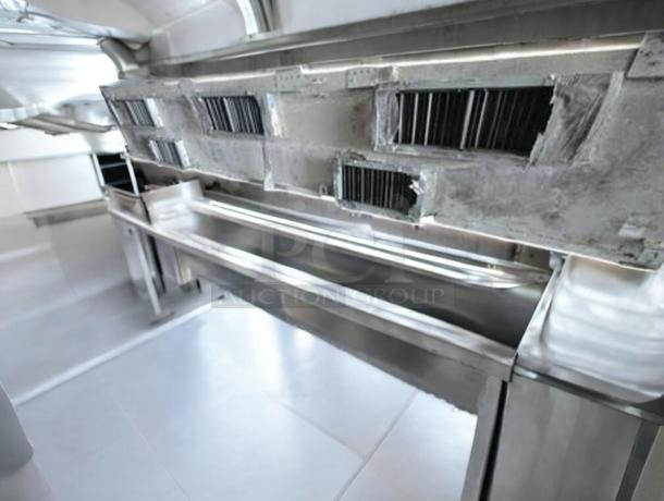 Pristine commercial stainless steel exhaust hood, fully tested, excellent condition, detailed metalwork, professionally installed.