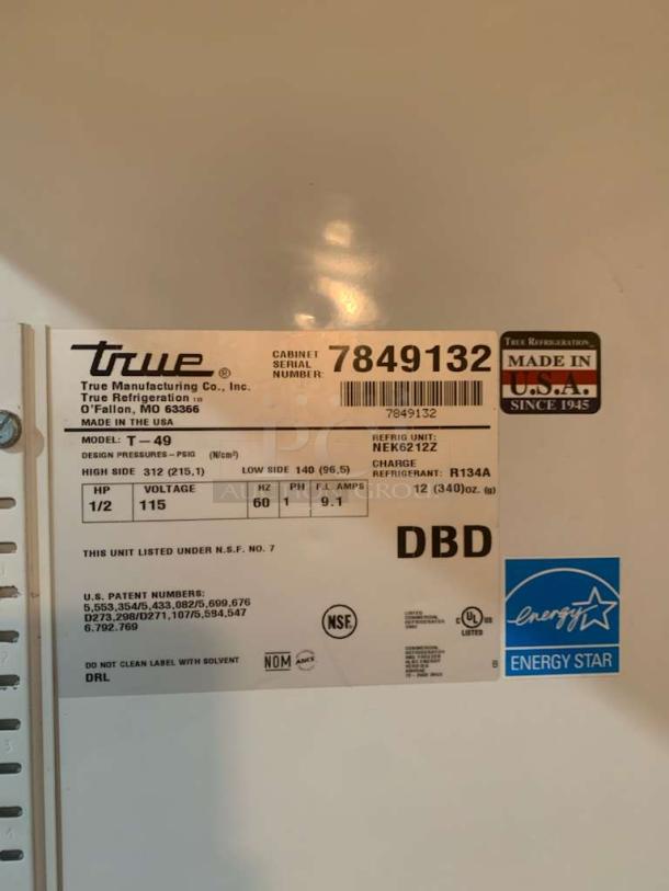 True T-49 2-Door Commercial Refrigerator tag; details: model T-49, 115V, 1/2 HP, NSF certified, Made in USA, Energy Star label.