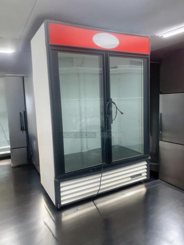 True GDM-49 double glass door merchandiser refrigerator in prime condition, fully tested and working, by True Manufacturing.