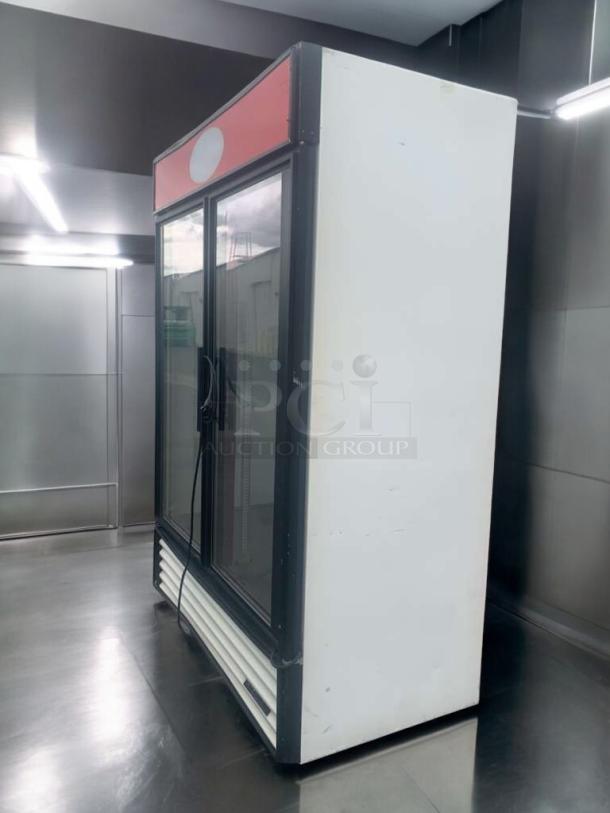 True GDM-49 double glass door merchandiser refrigerator in prime condition, fully tested and working.