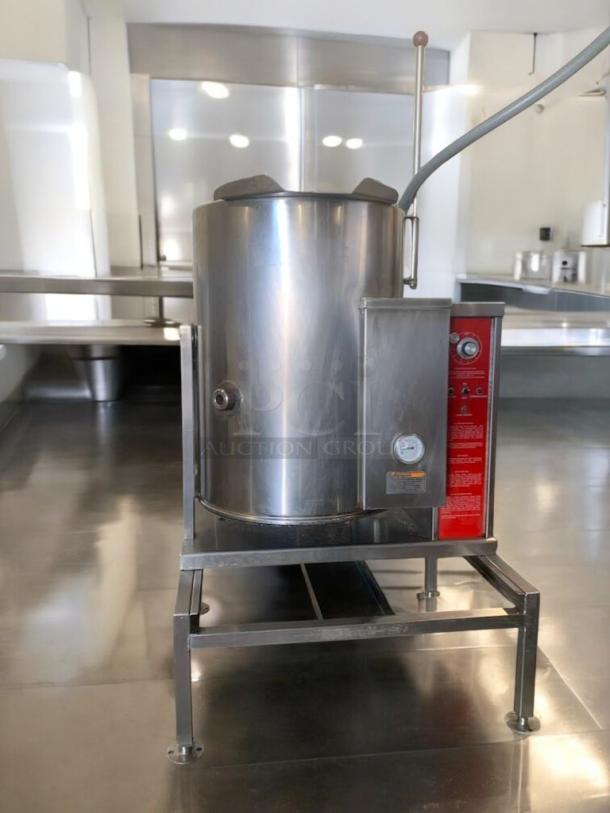 Prime condition Groen tilt skillet/steam kettle, 208V, fully tested. Large capacity electric model, stainless steel, on stand.