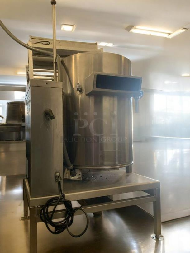 Groen electric steam kettle, large capacity, tilt skillet model, 208V. Prime condition, fully tested, stainless steel build.