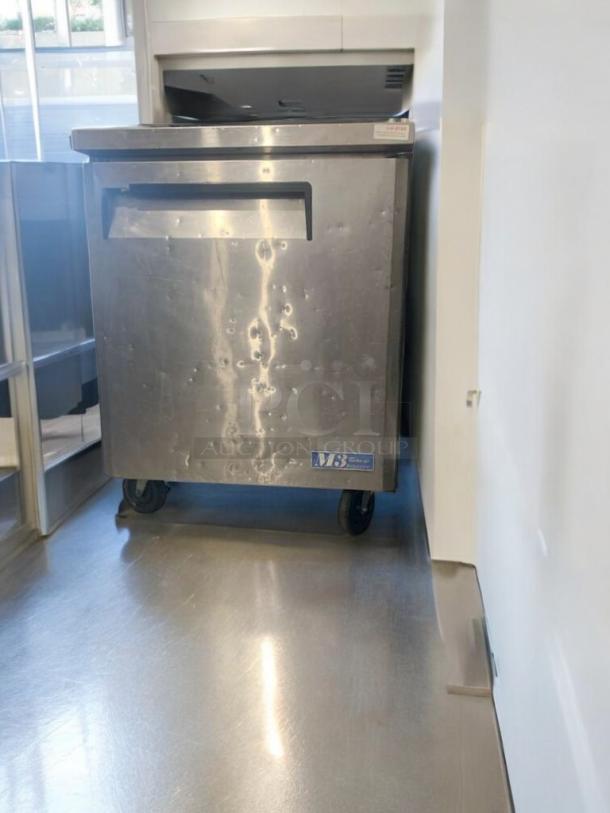 Turbo Air MUF-28 undercounter freezer, stainless steel, tested working, visible brand label, on wheels, excellent condition.