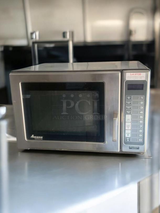 Amana RFS12MPSA commercial microwave oven, 120V, in prime condition. Features keypad, stainless steel finish, fully tested.