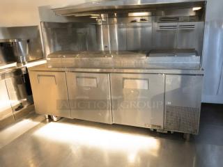 True TPP-93 mega-top refrigerated prep table in prime condition. Stainless steel, fully tested; ideal for commercial kitchens.