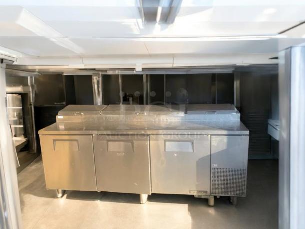 True TPP-93 Mega-Top Refrigerated Prep Table, prime condition, stainless steel, fully tested, made by True Manufacturing.