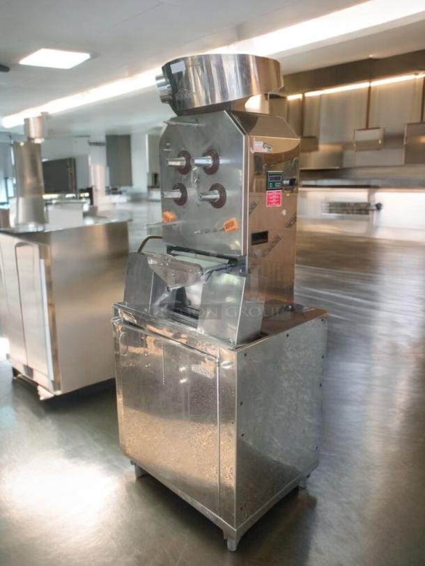 Immaculate CitroCasa 8000SB commercial citrus juicer, 115/120V, stainless steel, tested, working, visible labels.