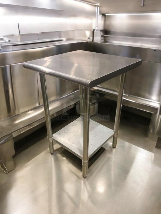 24" stainless steel prep table, commercial grade, flawless condition, heavy-duty with undershelf, fully tested and working.