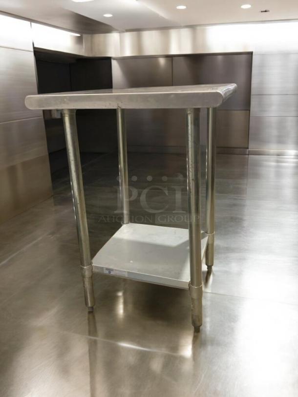Flawless 24" stainless steel prep table, commercial grade, heavy duty, fully tested, excellent condition.