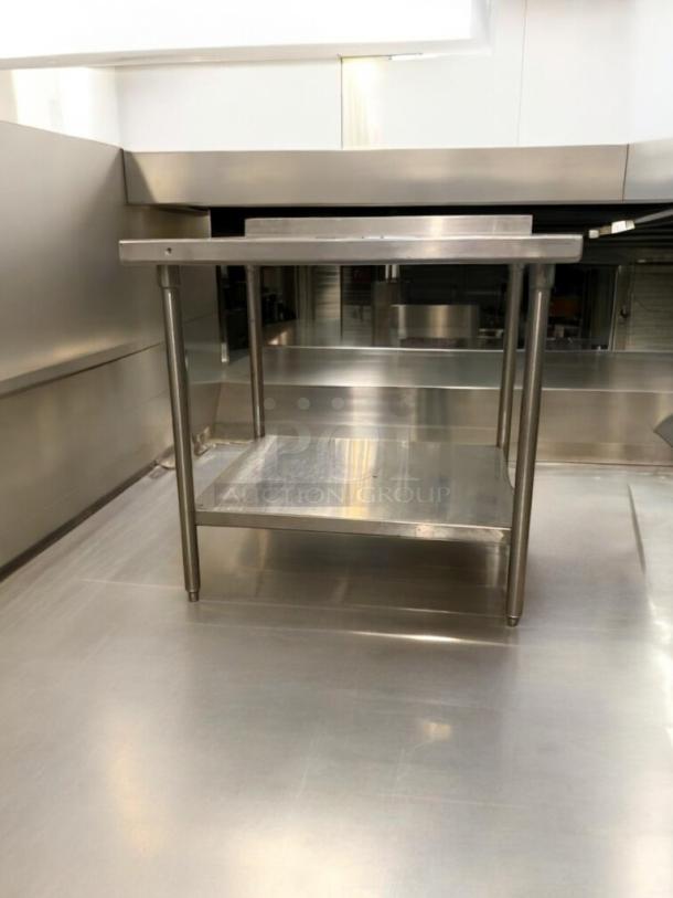 36" stainless steel prep table, heavy duty, commercial grade, superior condition, two-tier design, fully tested.