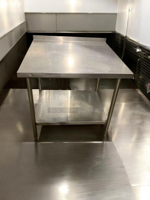36" stainless steel prep table, commercial grade, heavy duty, with undershelf. Excellent condition, fully tested and working.