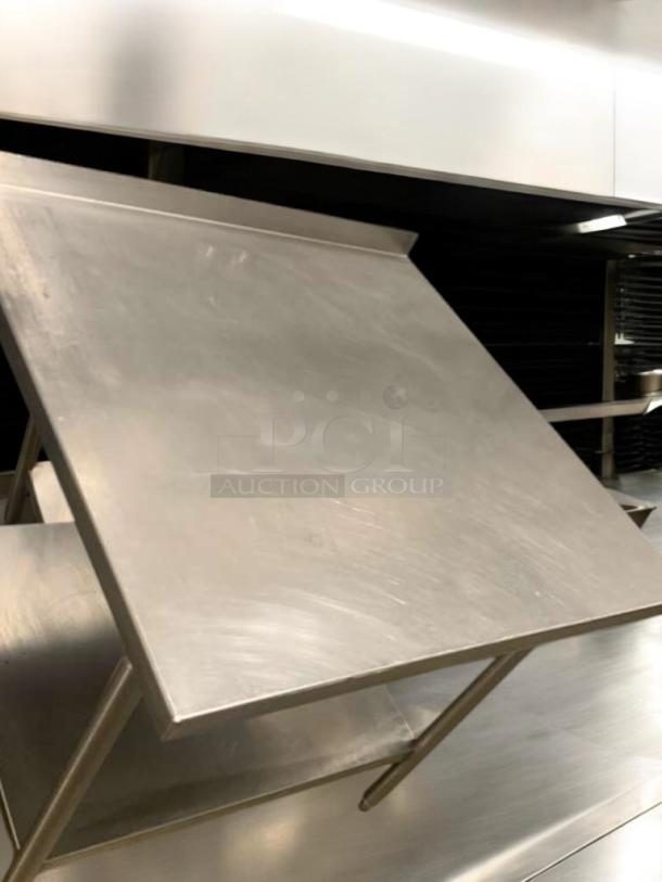 36" stainless steel prep table in superior condition, heavy-duty commercial work table, fully tested, high-quality material.