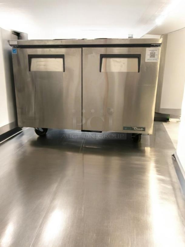 TRUE TUC-48-HC undercounter refrigerator, stainless steel, commercial grade, fully tested, dual doors, on casters.