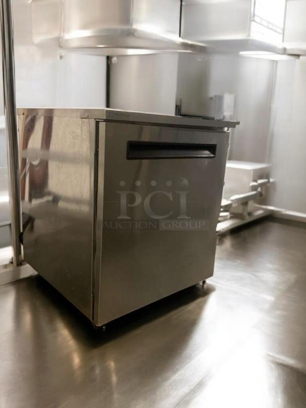 Delfield single door undercounter refrigerator, commercial grade, 115V, exceptional condition, stainless steel finish, fully tested.