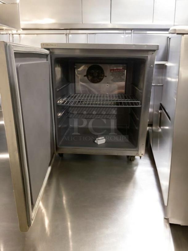 Delfield single door undercounter refrigerator in exceptional condition, commercial grade, fully tested, 115V.