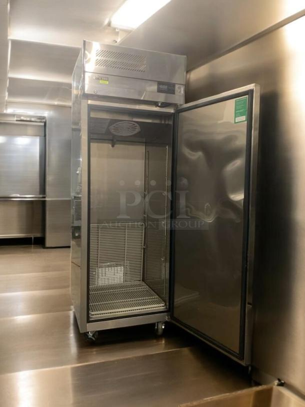 Turbo Air EF24-1-N-V commercial-grade single door freezer, stainless steel, excellent condition, open door showing interior.