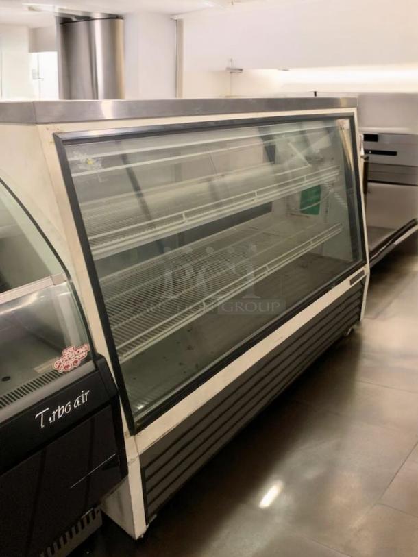 TRUE TCGG-36 refrigerated display case with curved glass, excellent condition, 115V, fully tested and working.