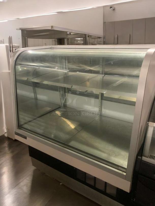 Schmidt curved glass refrigerated display case for bakery/deli, excellent condition, model tested, 115V. Fully functional.