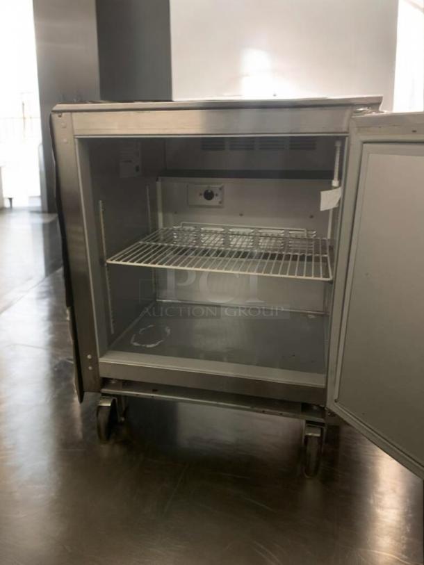 Beverage-Air UCR27A undercounter refrigerator, 27", commercial grade, excellent condition, includes shelf, 115V, fully tested.