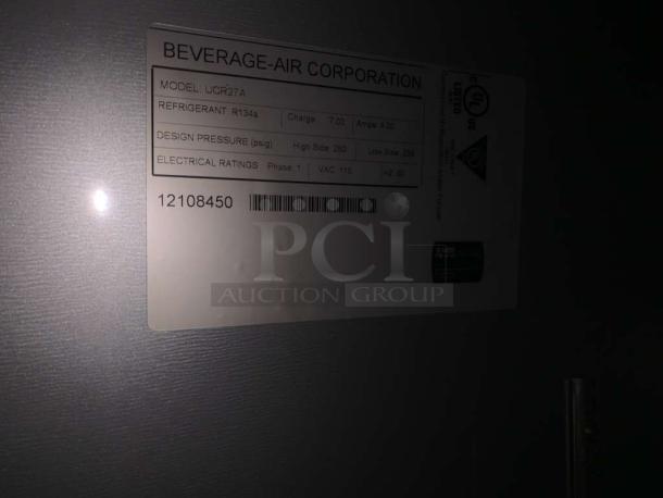 Beverage-Air UCR27A label showing model, electrical ratings, and refrigerant details on undercounter refrigerator.