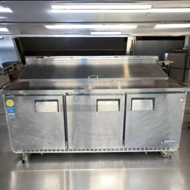 Continental Refrigerator sandwich prep table, top-tier condition, stainless steel, three-door, fully tested and working.