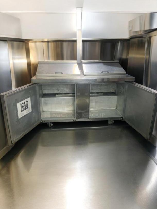 Continental Refrigerator Dual Cold Rail Prep Unit, commercial-grade, with open storage doors, stainless steel, fully tested.