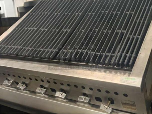 Commercial stainless steel countertop charbroiler, superb condition, heavy-duty gas grill, fully tested and working.