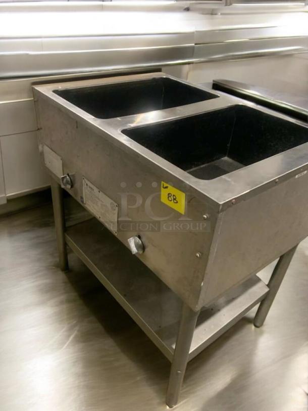 Eagle Metal Masters double well gas hot food table, waterless design, in remarkable condition, fully tested, lot 88 tag visible.